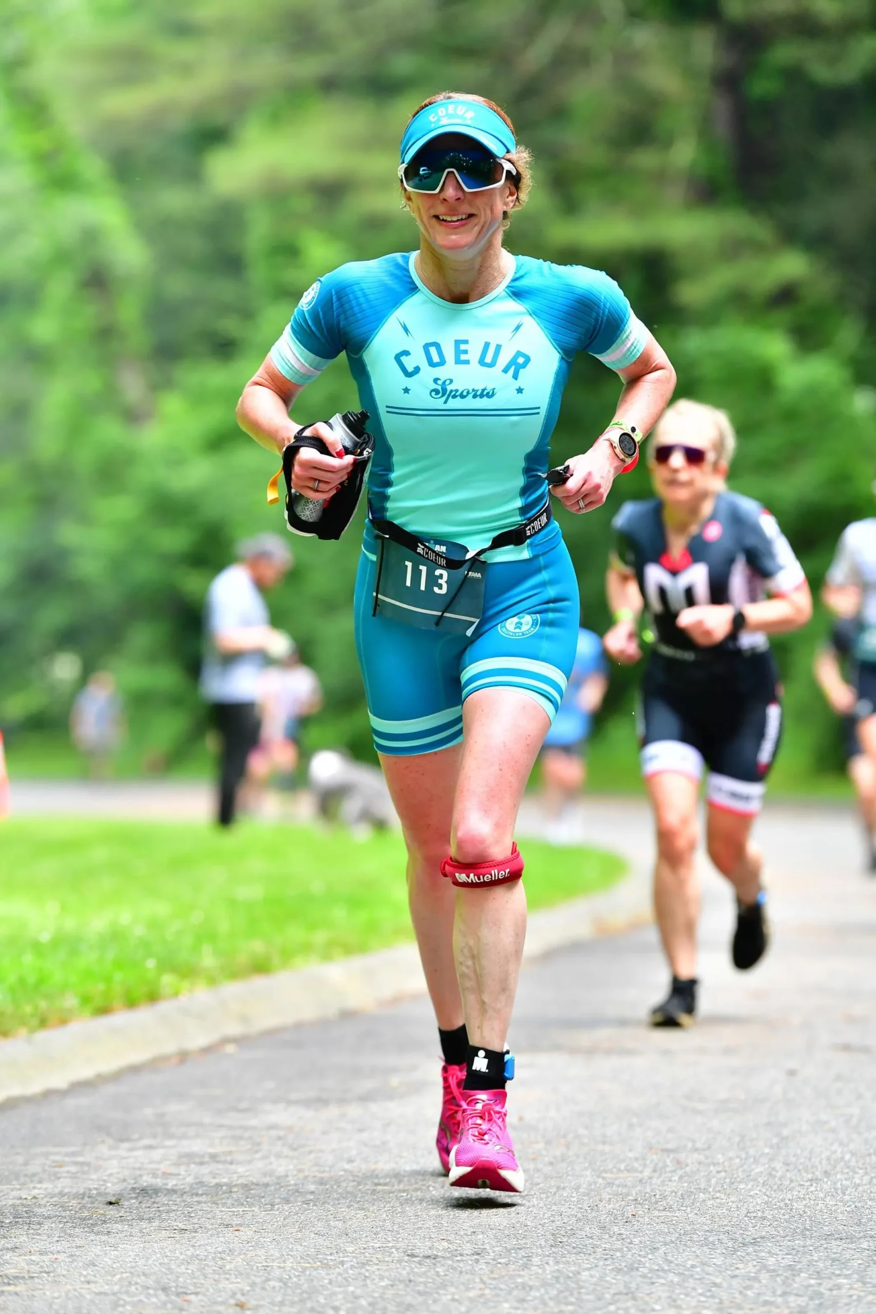 Jennifer F running in the Ironman Lake Placid Race
