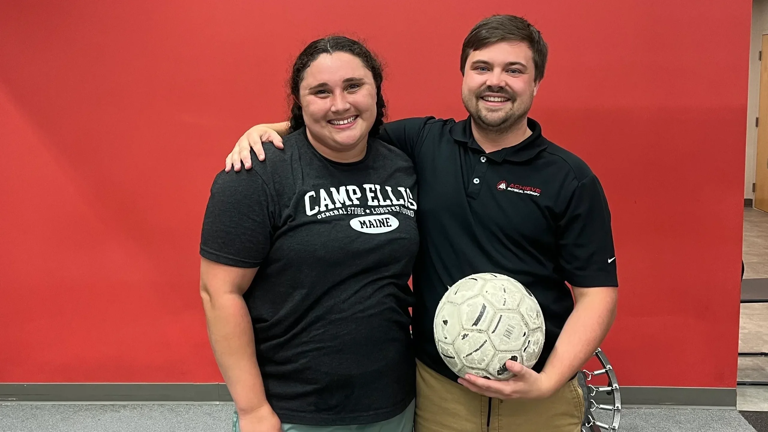 Maesy T and Ian N smiling after Maesy's post-surgical physical therapy sessions